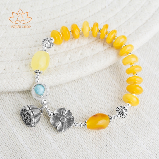 Bracelet of beeswax amber, lotus made of Hetian jade and turquoise