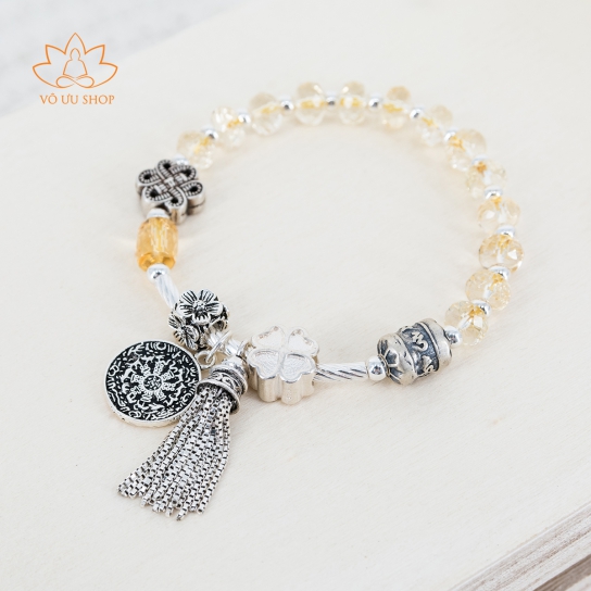 Bracelet of Citrine and silver charms