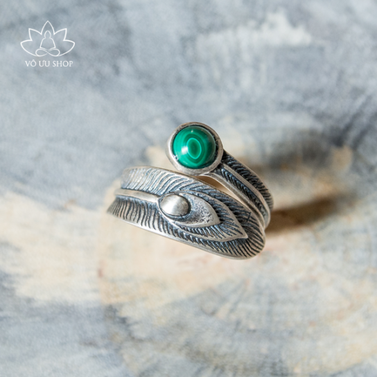 Silver ring formed as feather engraved Malachite