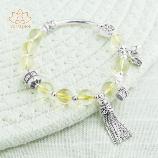 Yellow quartz with silver fly-whisk and leather charm