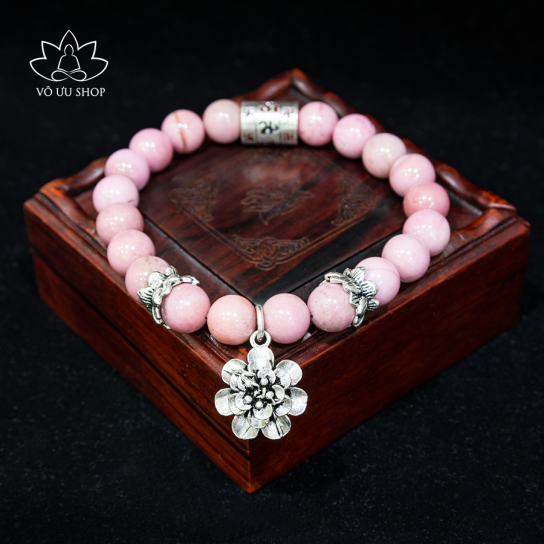 Rhodonite bracelet with charms of lucky flower, lotus, swastika and Om Mani Padme Hum