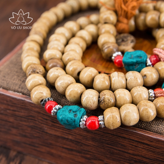 Buddhist prayer 108 beads made of Yak cow's bone, turquoise and spiritual items