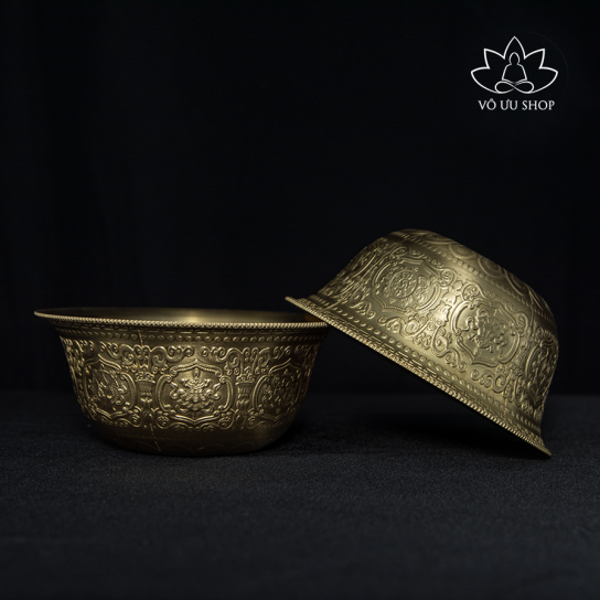 Set of Tibetan copper bowls engraved Eight Symbols of Good omen and mandala flower