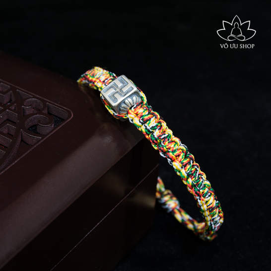Bracelet of Five color thread and charm of swastika