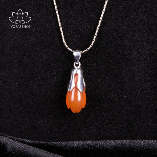 Red agate pendent designed as ylang ylang bud and silver stem