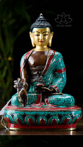 Red cooper statue of Bhaisajyaguru inlaid turquoise