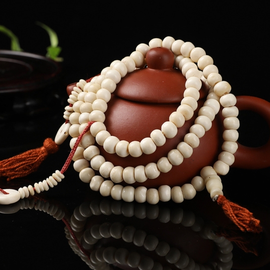 Buddhist prayer 108 beads made of Yak cow's bone, turquoise and spiritual items